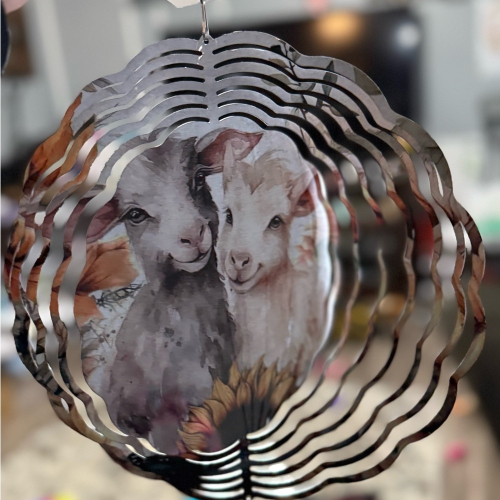 Charming Animal Wind Spinner - Black and White